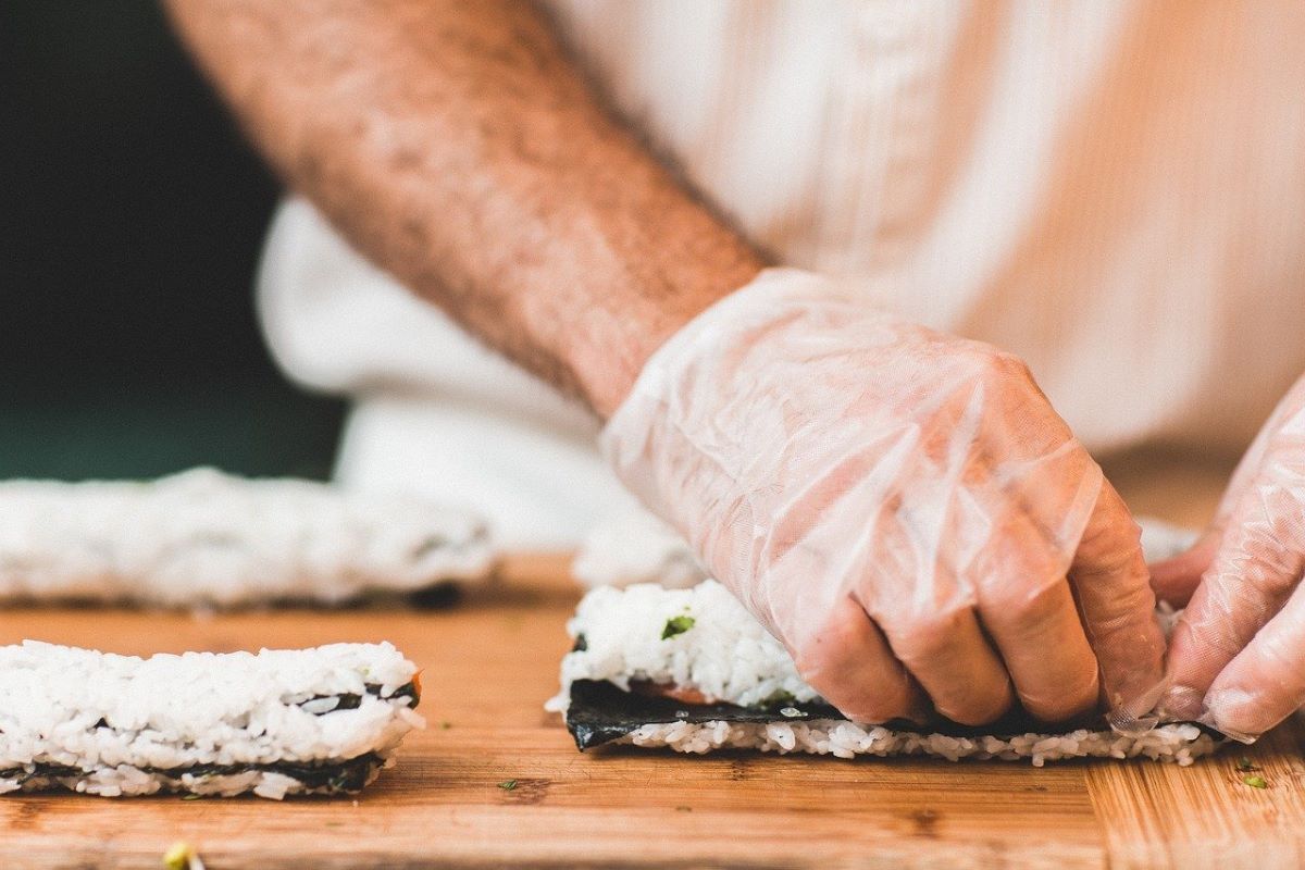 sushi being rolled