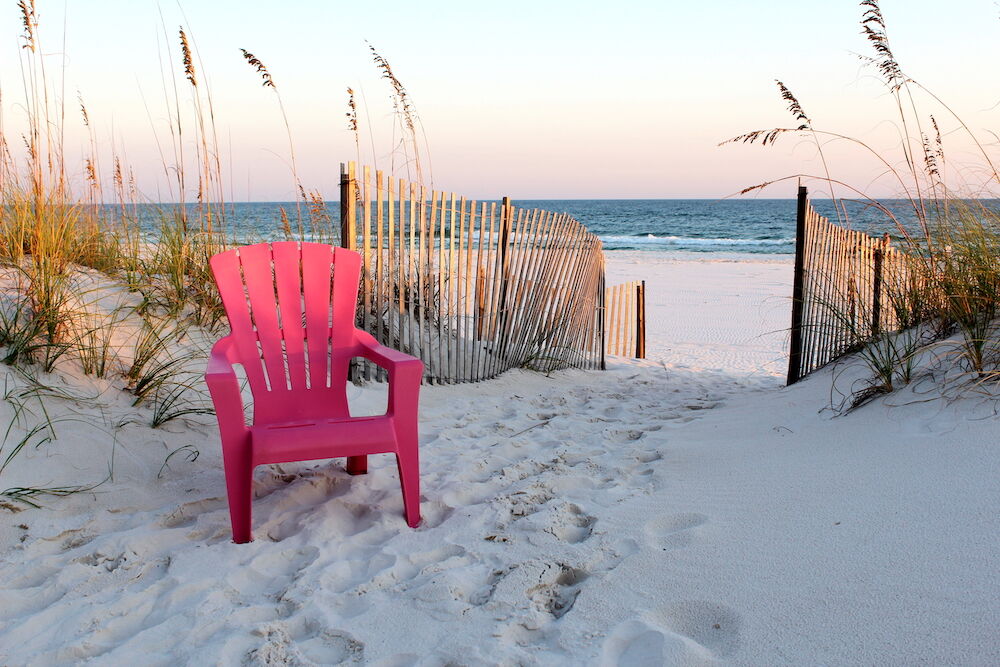 pink chair on the beach in Gulf Shores